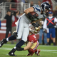 November 27, 2014; Santa Clara, CA, USA; Seattle Seahawks tight end Luke Willson (82, top) is tackled by San Francisco 49ers inside linebacker Chris Borland (50) during the first quarter at Levi's Stadium.